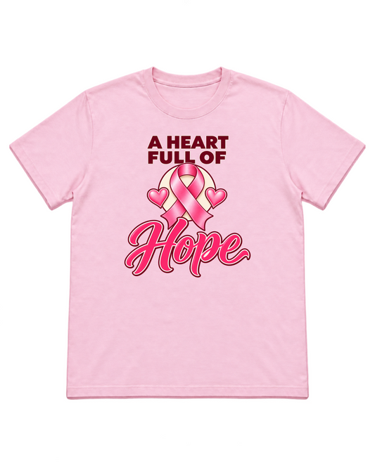 Digital mockup of A Heart Full Of Hope pink-ribbon design on a light-pink T-shirt