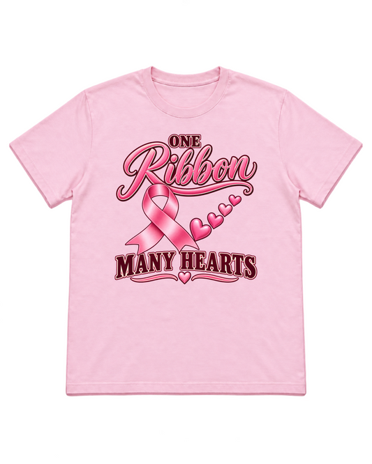 Digital mockup of One Ribbon Many Hearts on a Light Pink Gildan 5000 shirt